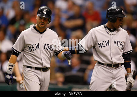 May 16, 2011 - St.Petersburg, Florida, U.S - New York Yankees right fielder Nick Swisher (33) and New York Yankees center fielder Curtis Granderson (14) celebrate after scoring during the match up between the Tampa Bay Rays and the New York Yankees at Tropicana Field. The Yankees lead 5-1 (Credit Image: © Luke Johnson/Southcreek Global/ZUMApress.com) Stock Photo