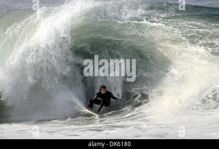 May 20, 2011 - Newport Beach, California, U.S. - Surfers take on the formidable waves at The Wedge at the extreme east end of the Balboa Peninsula in Newport Beach - a world famous surfing, bodyboarding and bodysurfing spot. The Wedge can produce waves up to 30 feet high during a south swell of a particular size and direction.  (Credit Image: © David Waters/ZUMAPRESS.com) Stock Photo