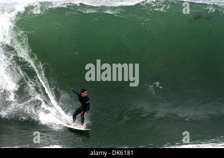 May 20, 2011 - Newport Beach, California, U.S. - Surfers take on the formidable waves at The Wedge at the extreme east end of the Balboa Peninsula in Newport Beach - a world famous surfing, bodyboarding and bodysurfing spot. The Wedge can produce waves up to 30 feet high during a south swell of a particular size and direction.  (Credit Image: © David Waters/ZUMAPRESS.com) Stock Photo