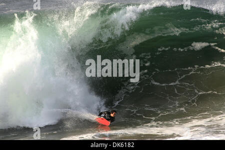 May 20, 2011 - Newport Beach, California, U.S. - Surfers take on the formidable waves at The Wedge at the extreme east end of the Balboa Peninsula in Newport Beach - a world famous surfing, bodyboarding and bodysurfing spot. The Wedge can produce waves up to 30 feet high during a south swell of a particular size and direction.  (Credit Image: © David Waters/ZUMAPRESS.com) Stock Photo