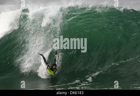 May 20, 2011 - Newport Beach, California, U.S. - Surfers take on the formidable waves at The Wedge at the extreme east end of the Balboa Peninsula in Newport Beach - a world famous surfing, bodyboarding and bodysurfing spot. The Wedge can produce waves up to 30 feet high during a south swell of a particular size and direction.  (Credit Image: © David Waters/ZUMAPRESS.com) Stock Photo