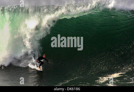 May 20, 2011 - Newport Beach, California, U.S. - Surfers take on the formidable waves at The Wedge at the extreme east end of the Balboa Peninsula in Newport Beach - a world famous surfing, bodyboarding and bodysurfing spot. The Wedge can produce waves up to 30 feet high during a south swell of a particular size and direction.  (Credit Image: © David Waters/ZUMAPRESS.com) Stock Photo