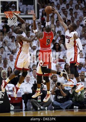 May 22, 2011 - West Palm Beach, Florida, U.S. -  MIAMI, FL..American Airlines Arena...Eastern Conference Finals. Round 3, Game 3.... Chicago Bulls vs Miami Heat..Miami Heat center Joel Anthony (50), Miami Heat power forward Chris Bosh (1) and Miami Heat shooting guard Dwyane Wade (3) block a shot taken byChicago Bulls small forward Luol Deng (9) in the first quarter. (Credit Image: Stock Photo