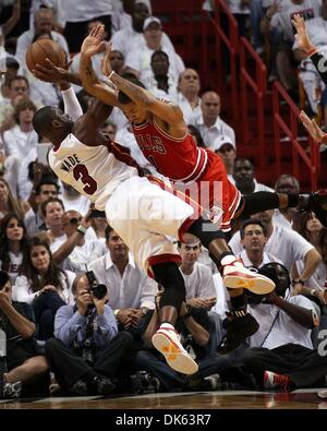 May 22, 2011 - West Palm Beach, Florida, U.S. -  MIAMI, FL..American Airlines Arena...Eastern Conference Finals. Round 3, Game 3.... Chicago Bulls vs Miami Heat..Miami Heat shooting guard Dwyane Wade (3) draws a foul from Chicago Bulls point guard Derrick Rose (1) in the fourth quarter. (Credit Image: © Allen Eyestone/The Palm Beach Post/ZUMAPRESS.com) Stock Photo