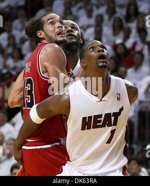 May 22, 2011 - West Palm Beach, Florida, U.S. -  MIAMI, FL..American Airlines Arena...Eastern Conference Finals. Round 3, Game 3.... Chicago Bulls vs Miami Heat..Chicago Bulls center Joakim Noah (13) is pinned by Miami Heat power forward Chris Bosh (1) and Miami Heat small forward LeBron James (6) under the basket. (Credit Image: © Allen Eyestone/The Palm Beach Post/ZUMAPRESS.com) Stock Photo