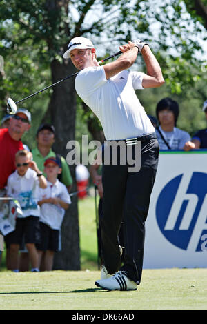 dustin-johnson-hits-his-tee-shot-on-the-second-hole-during-the-first