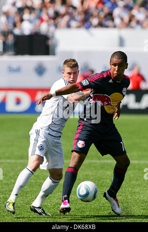 May 28, 2011 - Vancouver, British Columbia, Canada - Whitecaps # 8 Wes Knight pushes Red Bulls #17 Juan Agudelo to try and get to the ball New York Red Bulls tied Vancouver Whitecaps with a score of 1-1 on the Saturday game at the Empire Field in Vancouver. (Credit Image: © James Healey/Southcreek Global/ZUMAPRESS.com) Stock Photo