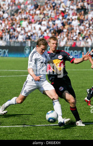 May 28, 2011 - Vancouver, British Columbia, Canada - Red Bulls #5 Tim Ream tries to stop Whitecaps #7 Terry Dunfield from kicking the ball to the net New York Red Bulls tied Vancouver Whitecaps with a score of 1-1 on the Saturday game at the Empire Field in Vancouver. (Credit Image: © James Healey/Southcreek Global/ZUMAPRESS.com) Stock Photo
