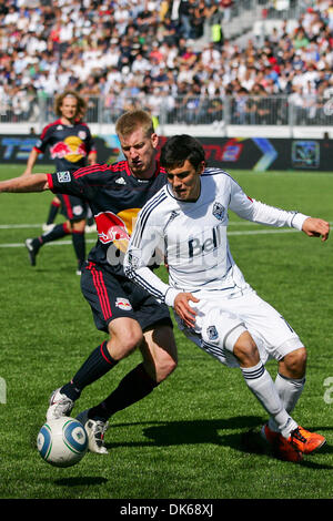 May 28, 2011 - Vancouver, British Columbia, Canada - Red Bulls #5 Tim Ream and Whitecaps # 17 Omar Saldago push to get the ball before it crosses the line New York Red Bulls tied Vancouver Whitecaps with a score of 1-1 on the Saturday game at the Empire Field in Vancouver. (Credit Image: © James Healey/Southcreek Global/ZUMAPRESS.com) Stock Photo