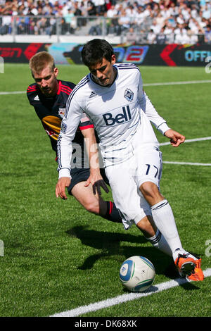 May 28, 2011 - Vancouver, British Columbia, Canada - Red Bulls #5 Tim Ream and Whitecaps # 17 Omar Saldago push to get the ball before it crosses the line New York Red Bulls tied Vancouver Whitecaps with a score of 1-1 on the Saturday game at the Empire Field in Vancouver. (Credit Image: © James Healey/Southcreek Global/ZUMAPRESS.com) Stock Photo