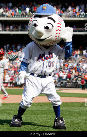 Mr. Met on top of the Shea Stadium dugout.