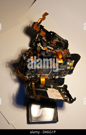 Exploded view of a broken dismantled digital single lens reflex camera, Sony Alpha A350 Stock Photo