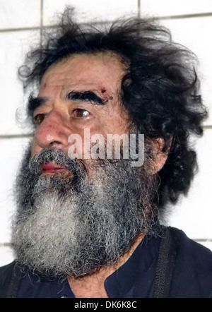 Former President of Iraq Saddam Hussein shortly after his capture by US Army forces December 14, 2003 in Tikrit, Iraq. Stock Photo