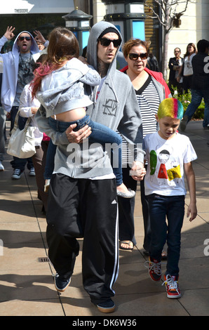 Travis Barker and his kids hanging out at The Grove Los Angeles, California - 14.03.12 Stock Photo