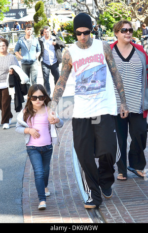 Travis Barker and his kids hanging out at The Grove Los Angeles, California - 14.03.12 Stock Photo