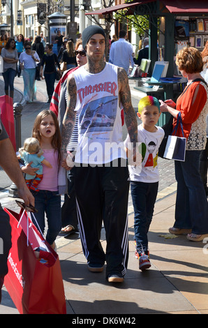 Travis Barker and his kids hanging out at The Grove Los Angeles, California - 14.03.12 Stock Photo