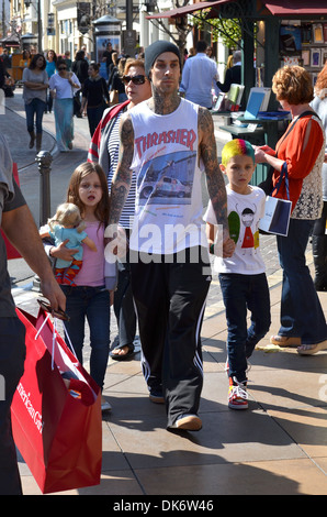 Travis Barker and his kids hanging out at The Grove Los Angeles, California - 14.03.12 Stock Photo