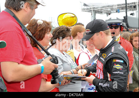 June 11, 2011 - Long Pond, Pennsylvania, United States of America - Regan Smith signs autographs for the fans after his qualifying run for the 5-Hour Energy 500 at the Pocono Raceway. (Credit Image: © Brian Freed/Southcreek Global/ZUMAPRESS.com) Stock Photo