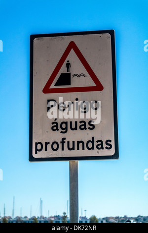 Danger Deep water sign in Portuguese Stock Photo