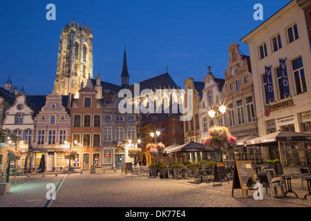 MECHELEN - SEPTEMBER 4: Grote markt and St. Rumbold's cathedral in evenig dusk in Sepetember 4, 2013 in Mechelen, Belgium. Stock Photo