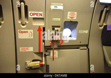 Airplane door, cabin door on a commercial jet airliner,  Airbus A321 Stock Photo