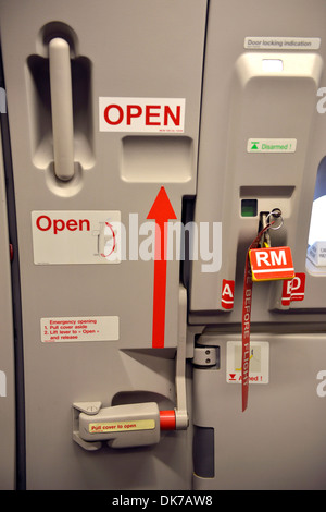Airplane door, cabin door on a commercial jet airliner,  Airbus A321 Stock Photo