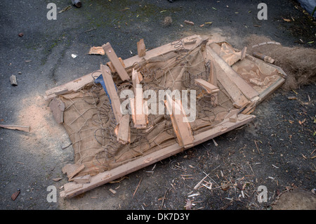 The remains of a piece of woodworm infested furniture Stock Photo