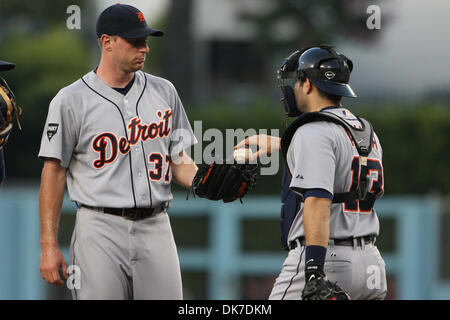 June 21, 2011 - Los Angeles, California, United States of America - Detroit Tigers catcher Alex Avila (13) walks the ball back to Detroit Tigers starting pitcher Max Scherzer (37) as they discuss strategy, during an inter-league game between the, Detroit Tigers  and the Los Angeles Dodgers at Dodger Stadium. (Credit Image: © Tony Leon/Southcreek Global/ZUMAPRESS.com) Stock Photo