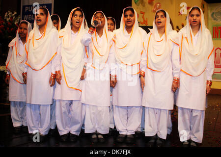 Lahore, Pakistan. 3rd Dec 2013. Disabled girls sing a song during a ceremony to mark the International Day of Persons with Disabilities Credit: © Xinhua/Alamy Live News  Stock Photo