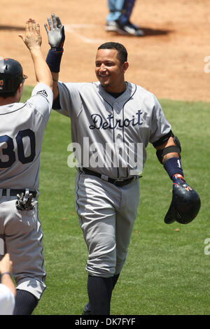 June 22, 2011 - Los Angeles, California, United States of America - Detroit Tigers first baseman Miguel Cabrera (24) receives congratulations from Detroit Tigers right fielder Magglio Ordonez (30) after hitting his 15th home run of the season. During an inter-league game between the, Detroit Tigers  and the Los Angeles Dodgers at Dodger Stadium.  The Tigers defeated the Dodgers 7-5 Stock Photo