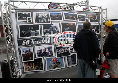 June 24, 2011 - Norwalk, Ohio, U.S - Fans look at a banner showing moments from the 60 years of NHRA. (Credit Image: © Alan Ashley/Southcreek Global/ZUMAPRESS.com) Stock Photo