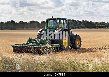 John Deere tractor harrowing Fenland field Stock Photo - Alamy