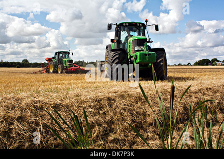John Deere tractor harrowing Fenland field Stock Photo - Alamy