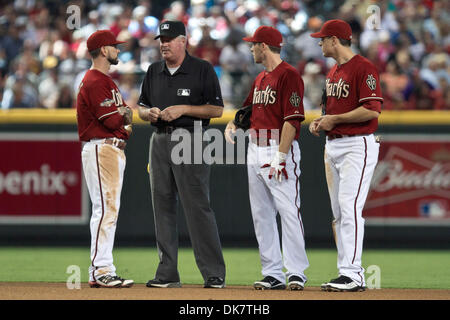 Arizona Diamondbacks third baseman Drew Ellis warms up during the first  inning of a spring training baseball game against the San Francisco Giants  Wednesday, March 23, 2022, in Scottsdale, Ariz. (AP Photo/Ross