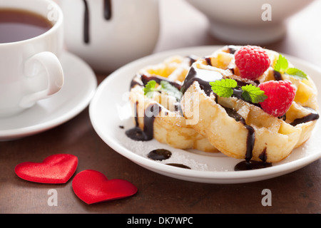 Belgian waffle with chocolate raspberry and hearts for Valentines Day Stock Photo