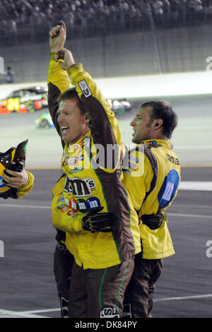 July 10, 2011 - Sparta, Kentucky, U.S - The M&M's crew celebrates driver Kyle Busch's victory in the inaugural Quaker State 400 at the Kentucky Speedway in Sparta, Kentucky. Kyle Busch won the race after starting on the pole. (Credit Image: © Michael Johnson/Southcreek Global/ZUMAPRESS.com) Stock Photo