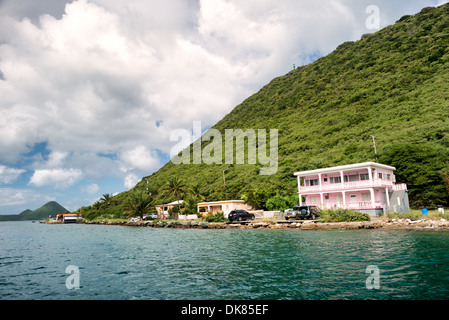 The waterfront of West End Harbour on Tortola in the British Virgin Islands. Known for its diverse marine life and coral reefs, the Caribbean region boasts some of the world's most beautiful and well-preserved beachscapes. Stock Photo