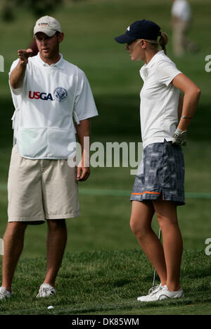 Jul 10, 2011 - Colorado Springs, Colorado, U.S. - AMY ANDERSON discusses the next shot wih her caddie before hitting s chip on 13. Play in the third round resumed Sunday after lightning delays and darkness halted play Saturday evening in Colorado at the Broadmoor Country Club in Colorado Springs. (Credit Image: © Will Powers/ZUMAPress.com) Stock Photo