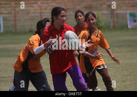 Jul 11, 2011 - Srinagar, Kashmir, India - Kashmiri muslim School girls in take part during final match of 5th State Rugby 7's Tournament at Bakshi Stadium in Srinagar, the summer capital of Indian Kashmir. (Credit Image: © Altaf Zargar/ZUMAPRESS.com) Stock Photo