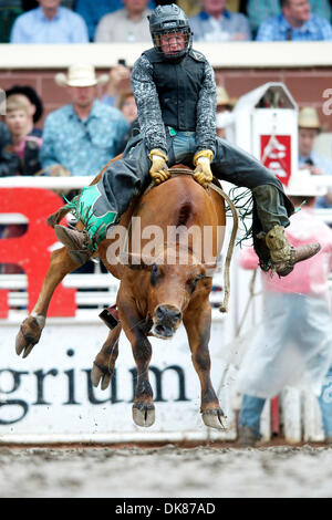 July 11, 2011 - Calgary, Alberta, Canada - Cooper Zur of Lumbreck, AB competes during the boys steer riding competition at the Calgary Stampede at Stampede Park in Calgary, AB Canada. (Credit Image: © Matt Cohen/Southcreek Global/ZUMAPRESS.com) Stock Photo