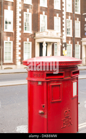 English style red mailboxe and vintage buildings Stock Photo