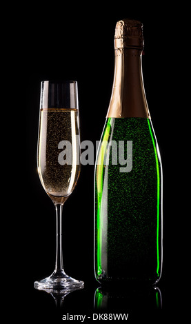 Celebratory golden champagne on a black background Stock Photo