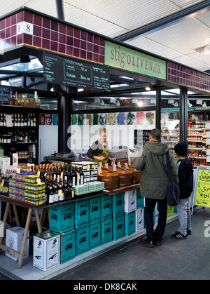 Olives shops at Torvehallerne, the new food market opened in Sept. 2011 at Israels Plads, Copenhagen, Denmark. Stock Photo