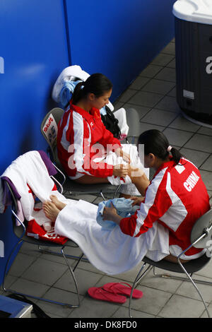 Jul 22, 2011 - Shanghai, China - HE ZI and WU MINXIA of China relax during the semifinal round of competition in the women's 3 meter springboard at the FINA World Championships. Both advanced to the final. (Credit Image: © Jeremy Breningstall/ZUMAPRESS.com) Stock Photo