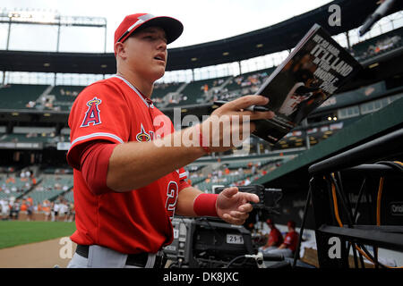 July 24, 2011 - Baltimore, Maryland, U.S - Los Angeles Angels Outfielder Mike Trout  (27) signs an autograph before a game between the Los Angeles Angels and the Baltimore Orioles, the Angels won 9-3 (Credit Image: © TJ Root/Southcreek Global/ZUMApress.com) Stock Photo