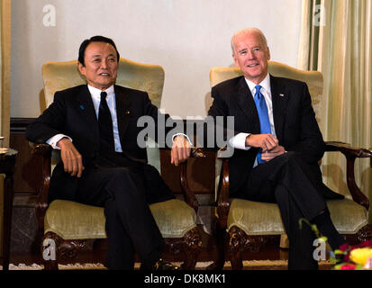 US Vice President Joe Biden meets with Japanese Deputy Prime Minister and Finance Minister Taro Aso at the US ambassador's residence December 3, 2013 in Tokyo, Japan. Stock Photo