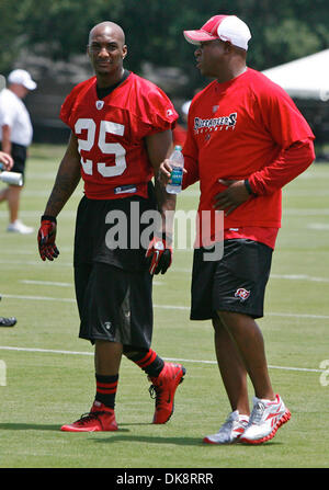 July 30, 2011 - DANIEL WALLACE   |   Times.TP 341686 WALL Bucs 4 (07/30/2011 Tampa) Tampa Bay Buccaneers cornerback Aqib Talib (25) walks with head coach Raheem Morris before Tampa Bay Buccaneers training camp at One Buc Place in Tampa on Saturday. [DANIEL WALLACE, Times] (Credit Image: © St. Petersburg Times/ZUMAPRESS.com) Stock Photo