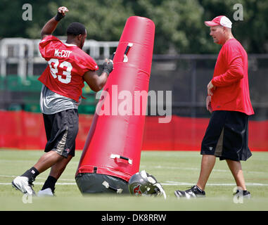 July 30, 2011 - DANIEL WALLACE   |   Times.TP 341686 WALL Bucs 1 (07/30/2011 Tampa) defensive tackle Gerald McCoy (93) works with defensive line coach Keith Millard during Tampa Bay Buccaneers training camp at One Buc Place in Tampa on Saturday. [DANIEL WALLACE, Times] (Credit Image: © St. Petersburg Times/ZUMAPRESS.com) Stock Photo