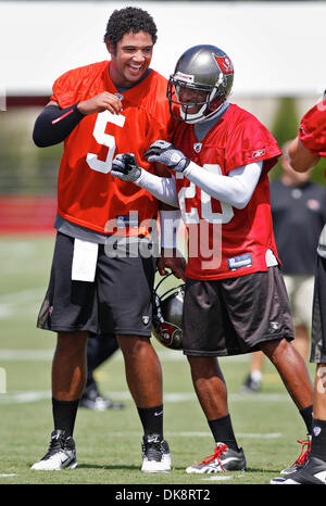 July 30, 2011 - DANIEL WALLACE   |   Times.TP 341686 WALL Bucs 8 (07/30/2011 Tampa) Quarterback Josh Freeman (5) jokes around with cornerback Ronde Barber (20) during Tampa Bay Buccaneers training camp at One Buc Place in Tampa on Saturday. [DANIEL WALLACE, Times] (Credit Image: © St. Petersburg Times/ZUMAPRESS.com) Stock Photo