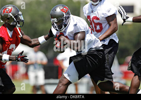 July 30, 2011 - DANIEL WALLACE   |   Times.TP 341686 WALL Bucs 17 (07/30/2011 Tampa) Running back LeGarrette Blount (27) puts his head down and blasts through the defense during Tampa Bay Buccaneers training camp at One Buc Place in Tampa on Saturday. [DANIEL WALLACE, Times] (Credit Image: © St. Petersburg Times/ZUMAPRESS.com) Stock Photo